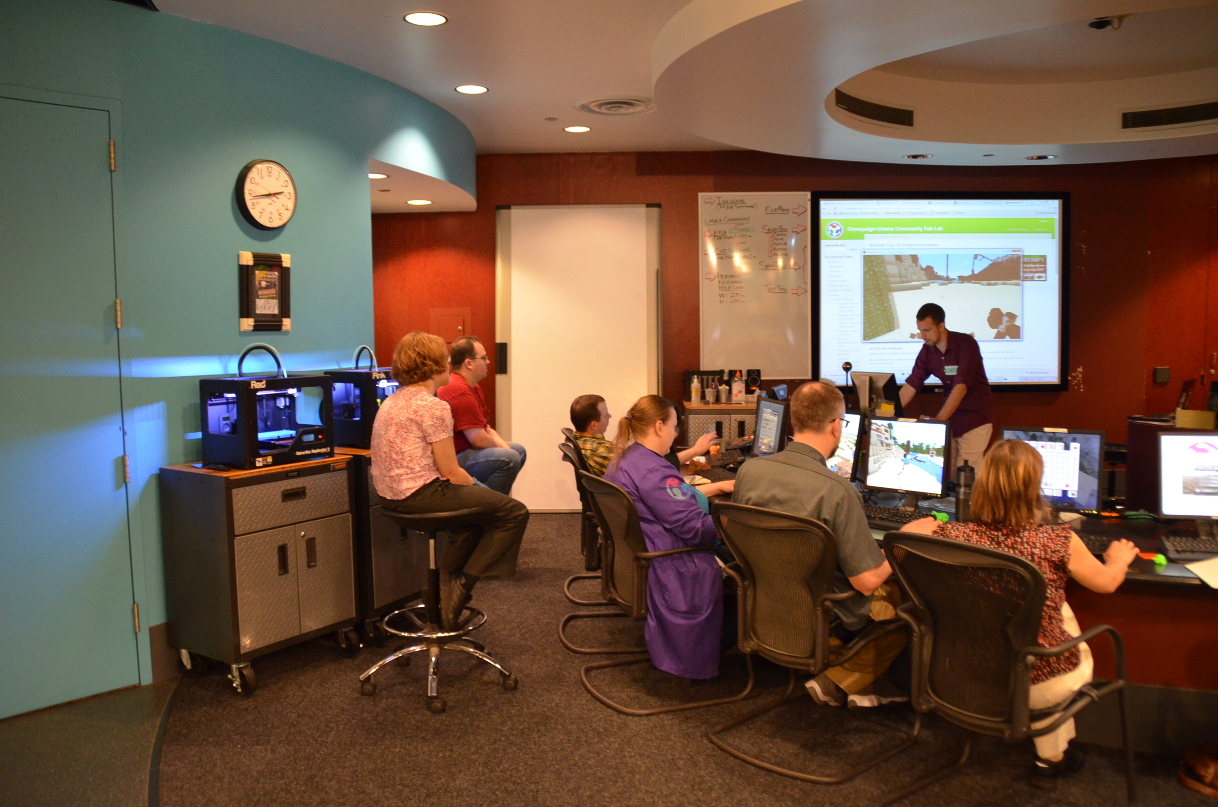 A "Shareout" in 2014 with our sister Fab Lab at the Museum of Science and Industry. We did cross training regularly over the years, this is me sharing using Minecraft for 3D modeling, scanning and printing.